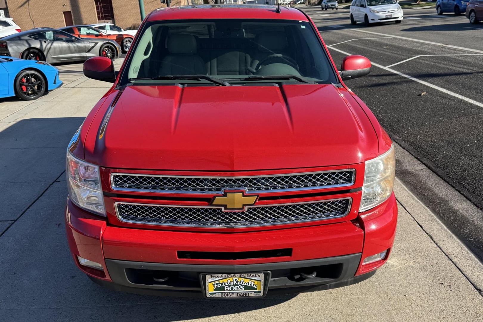 2012 Victory Red /Gray Chevrolet Silverado 1500 Extended Cab LTZ (1GCRKTE72CZ) with an V8 5.3 Liter engine, Automatic 6 Speed transmission, located at 2304 W. Main St., Boise, ID, 83702, (208) 342-7777, 43.622105, -116.218658 - Financing Available O.A.C. - Photo#3