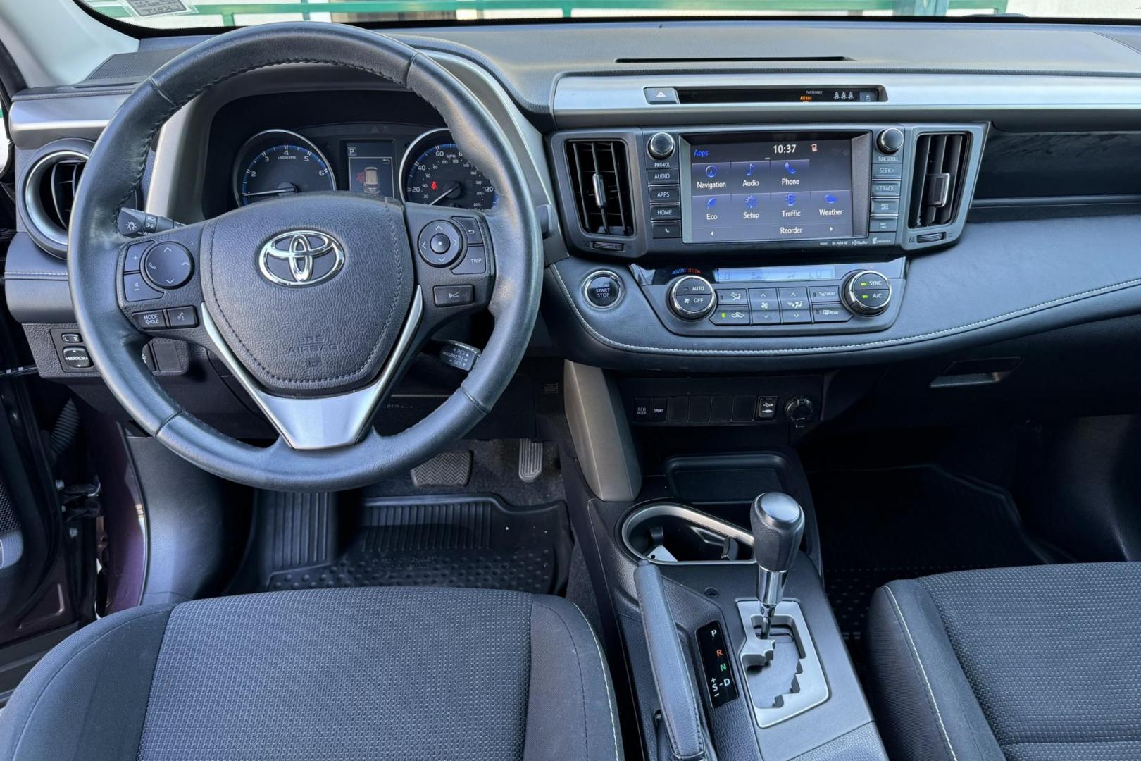 2018 Black Currant Metallic /Black Toyota RAV4 XLE (2T3RFREVXJW) with an 4 Cyl. 2.4 Liter engine, Automatic transmission, located at 2304 W. Main St., Boise, ID, 83702, (208) 342-7777, 43.622105, -116.218658 - The Combination of Low Miles And Toyota Dependability Make This An SUV You'll Be Able To Enjoy For A Long, Long Time! - Photo#17