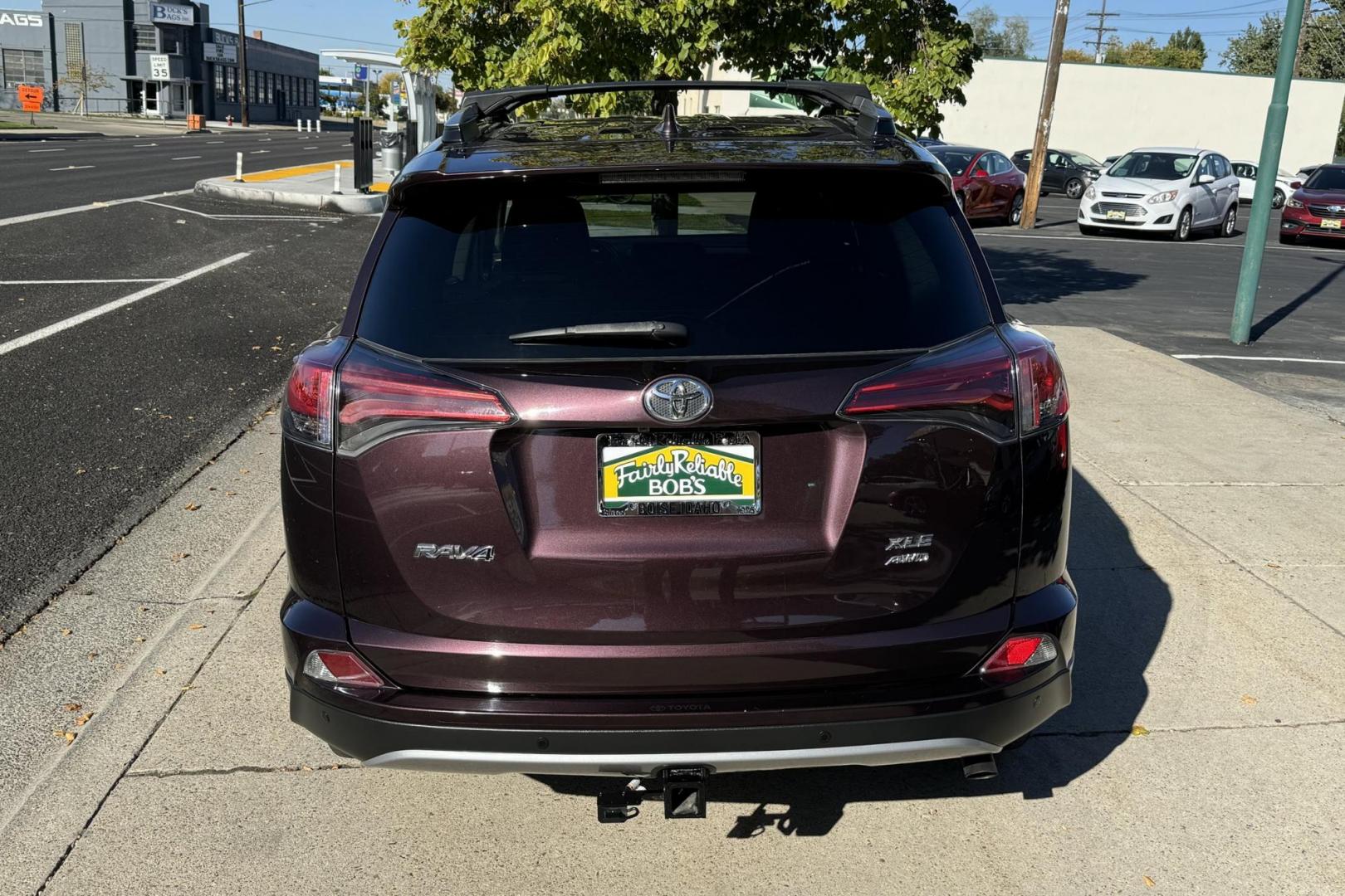 2018 Black Currant Metallic /Black Toyota RAV4 XLE (2T3RFREVXJW) with an 4 Cyl. 2.4 Liter engine, Automatic transmission, located at 2304 W. Main St., Boise, ID, 83702, (208) 342-7777, 43.622105, -116.218658 - The Combination of Low Miles And Toyota Dependability Make This An SUV You'll Be Able To Enjoy For A Long, Long Time! - Photo#1