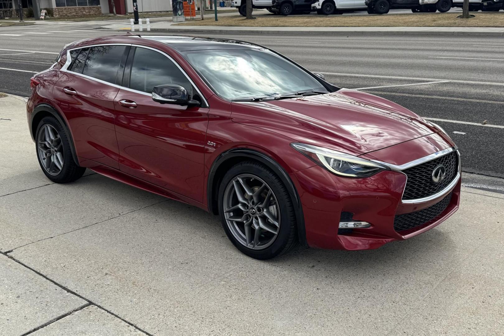 2018 Magnetic Red /Black Infiniti QX30S Sport (SJKCH5CPXJA) with an 4 Cyl 2.0 Liter Turbo engine, Automatic 7 Speed transmission, located at 2304 W. Main St., Boise, ID, 83702, (208) 342-7777, 43.622105, -116.218658 - Well Optioned And Very Fun To Drive! - Photo#2