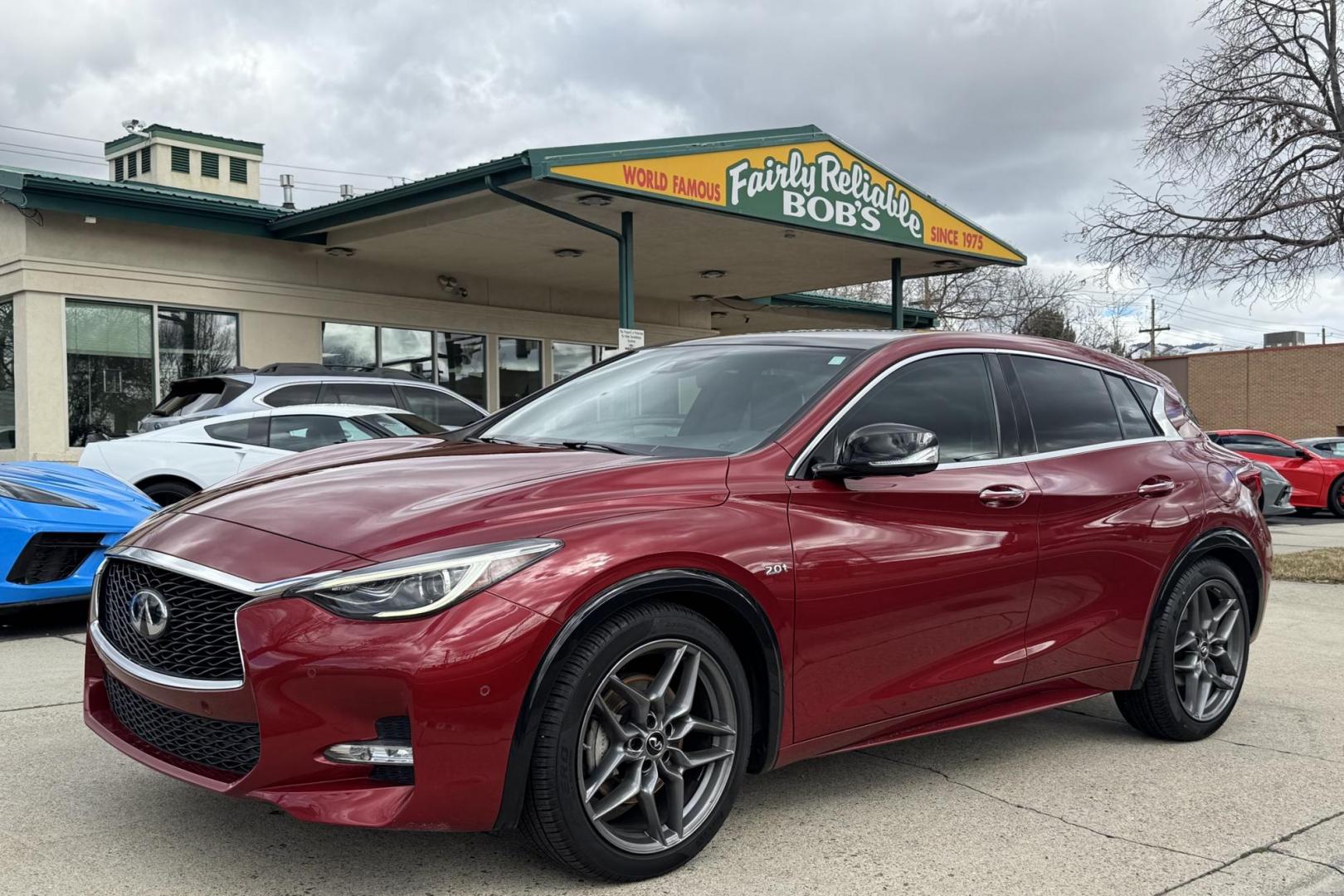 2018 Magnetic Red /Black Infiniti QX30S Sport (SJKCH5CPXJA) with an 4 Cyl 2.0 Liter Turbo engine, Automatic 7 Speed transmission, located at 2304 W. Main St., Boise, ID, 83702, (208) 342-7777, 43.622105, -116.218658 - Well Optioned And Very Fun To Drive! - Photo#0