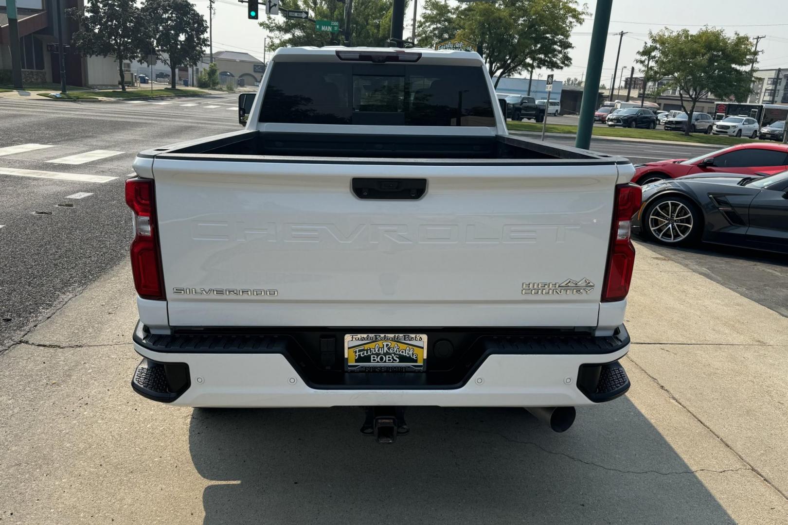 2021 Summit White /Brown/Black Chevrolet Silverado 3500HD High Country High Country Crew Cab (1GC4YVEY9MF) with an V8 6.6 liter Turbo-Diesel engine, Automatic transmission, located at 2304 W. Main St., Boise, ID, 83702, (208) 342-7777, 43.622105, -116.218658 - Magnificent Truck! Ready To Haul! Power Running Boards Too! - Photo#3