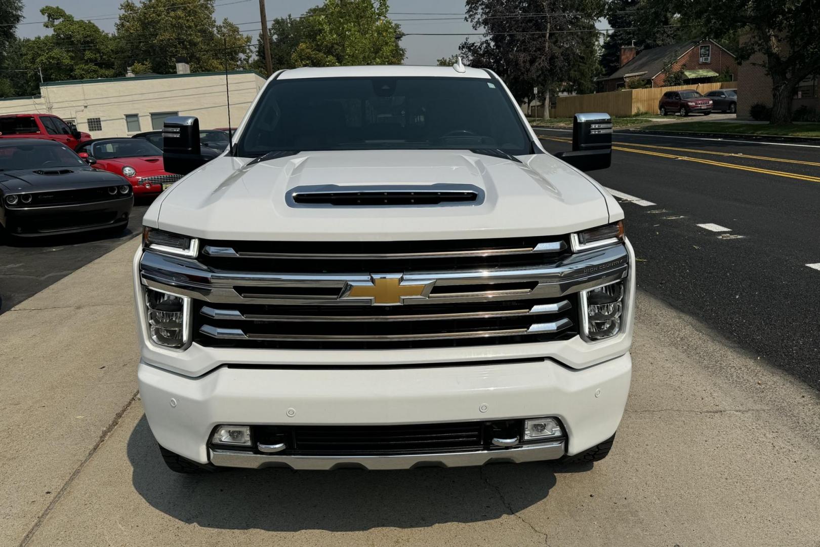 2021 Summit White /Brown/Black Chevrolet Silverado 3500HD High Country High Country Crew Cab (1GC4YVEY9MF) with an V8 6.6 liter Turbo-Diesel engine, Automatic transmission, located at 2304 W. Main St., Boise, ID, 83702, (208) 342-7777, 43.622105, -116.218658 - Magnificent Truck! Ready To Haul! Power Running Boards Too! - Photo#1