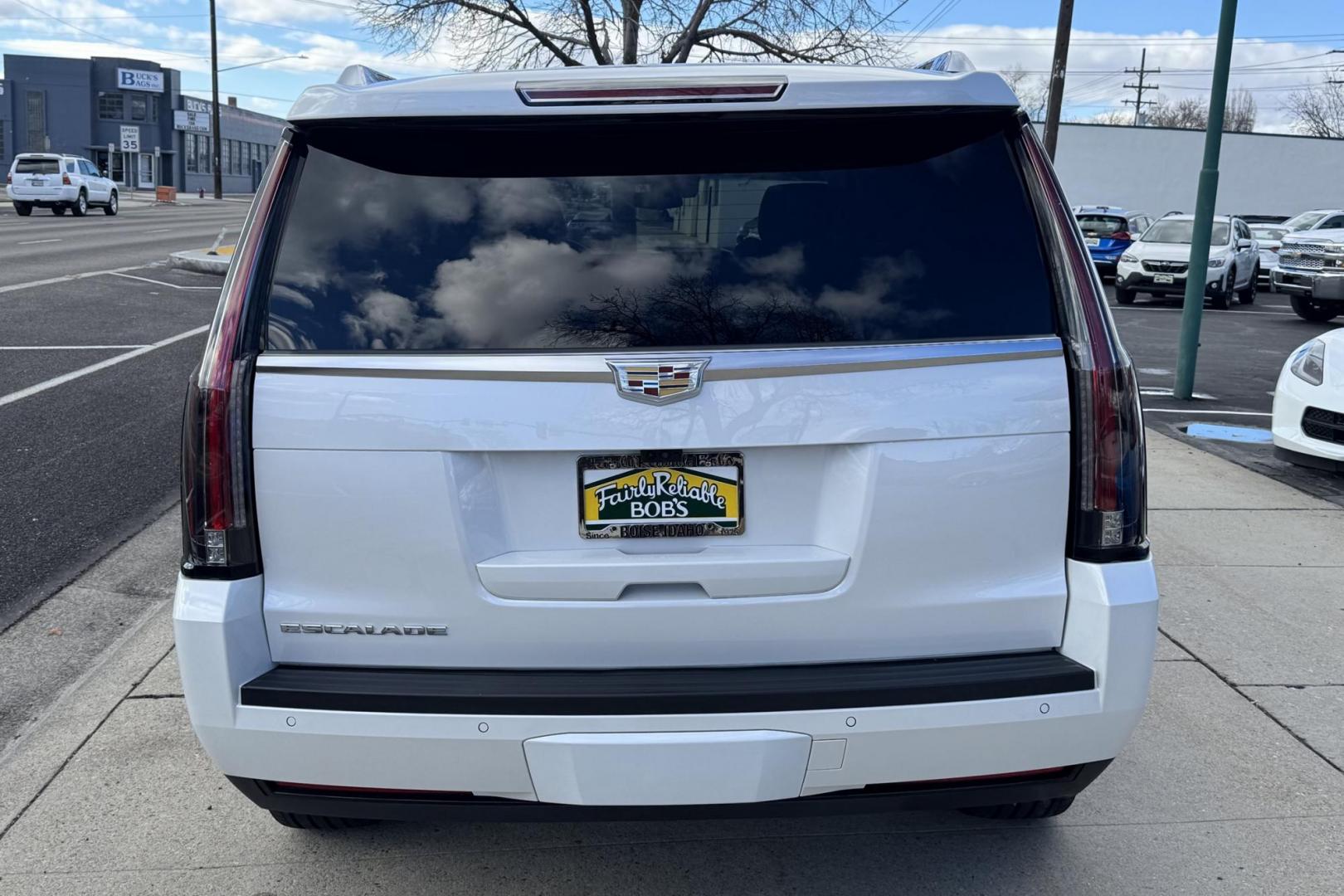 2017 Crystal White Tricoat /Black Cadillac Escalade Luxury (1GYS4BKJ9HR) with an V8 6.2 Liter engine, Automatic 8 Speed transmission, located at 2304 W. Main St., Boise, ID, 83702, (208) 342-7777, 43.622105, -116.218658 - Pristine Escalade! - Photo#1