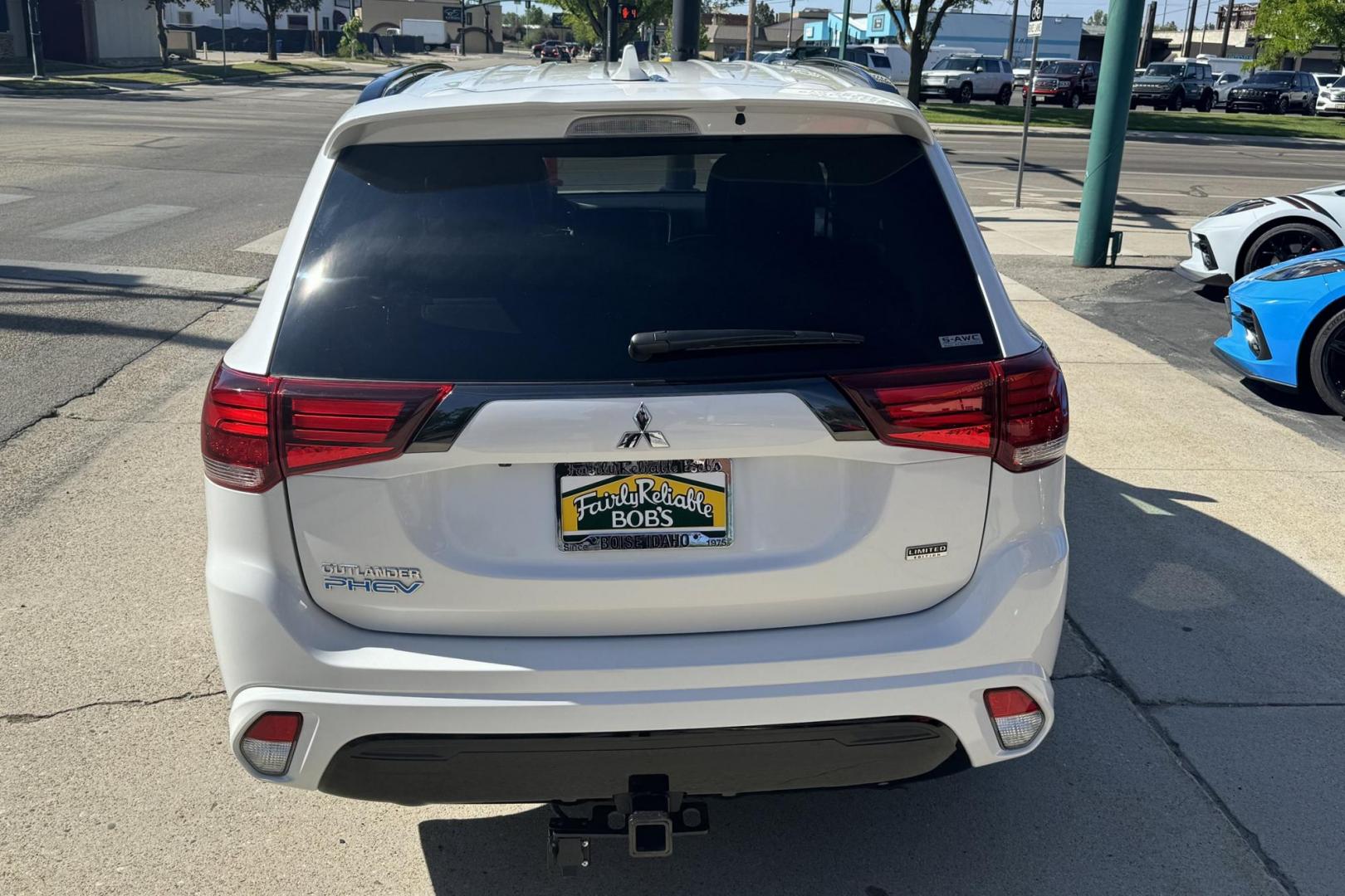 2021 White Diamond Pearl /Black Mitsubishi Outlander SEL (JA4J2VA76MZ) with an 2.4L DOHC MIVEC 4-Cylinder engine, Automatic transmission, located at 2304 W. Main St., Boise, ID, 83702, (208) 342-7777, 43.622105, -116.218658 - 2021 Mitsubishi Outlander PHEV SEL - Photo#1