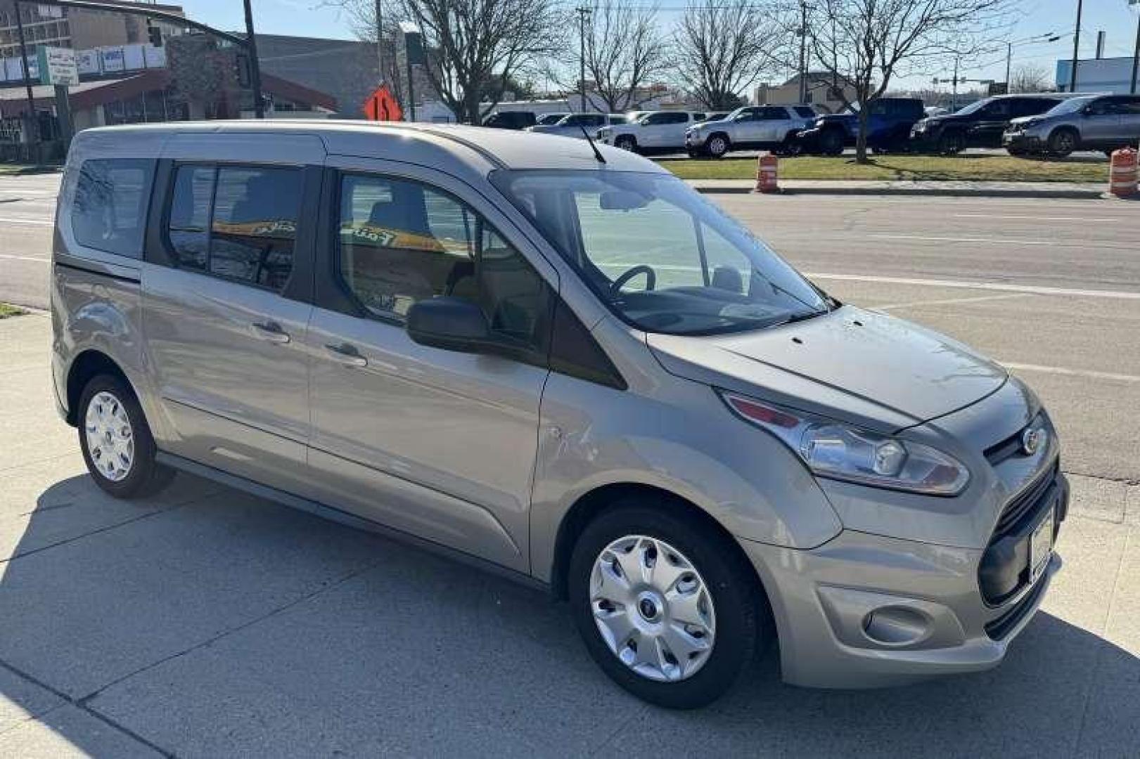 2014 Tectonic Silver Metallic /Gray FORD TRANSIT CONNECT WAGON XLT (NM0GS9F74E1) with an 2.5L DURATEC I4 engine, 6-Speed SelectShift Automatic transmission, located at 2304 W. Main St., Boise, ID, 83702, (208) 342-7777, 43.622105, -116.218658 - Photo#1