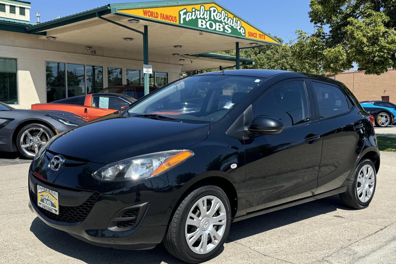 2014 Briliant Black /Black Mazda Mazda2 Sport (JM1DE1KY7E0) with an 4 Cyl 1.5 Liter engine, Automatic transmission, located at 2304 W. Main St., Boise, ID, 83702, (208) 342-7777, 43.622105, -116.218658 - Fuel Miser! Financing Available O.A.C. - Photo#0