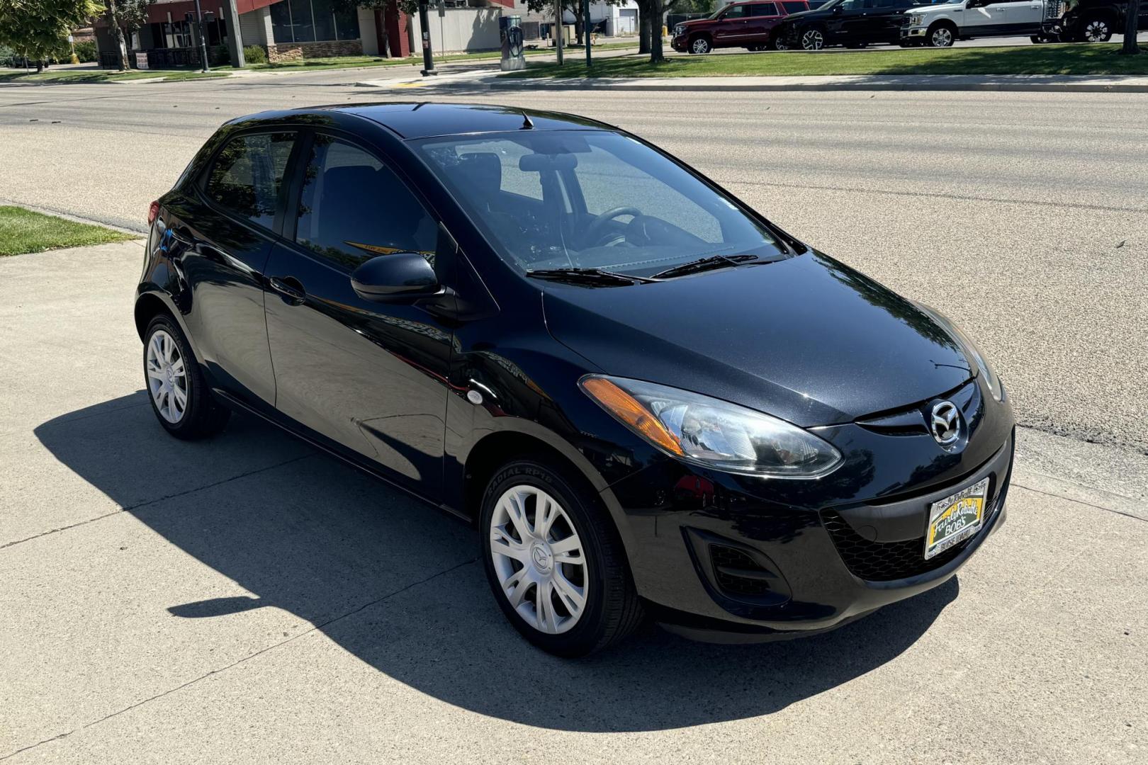 2014 Briliant Black /Black Mazda Mazda2 Sport (JM1DE1KY7E0) with an 4 Cyl 1.5 Liter engine, Automatic transmission, located at 2304 W. Main St., Boise, ID, 83702, (208) 342-7777, 43.622105, -116.218658 - Fuel Miser! Financing Available O.A.C. - Photo#2