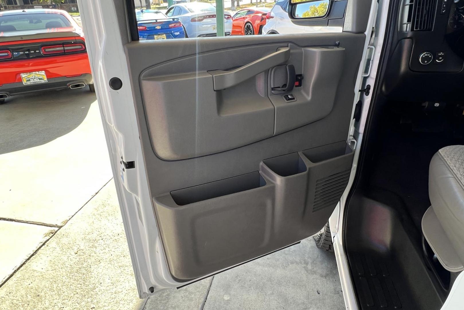 2019 Summit White /Gray CHEVROLET EXPRESS PASSENGER LT (1GAZGPFG3K1) with an VORTEC 6.0L V8 SFI FLEXFUEL engine, 8-speed automatic, electronically controlled with transmission, located at 2304 W. Main St., Boise, ID, 83702, (208) 342-7777, 43.622105, -116.218658 - 2019 CHEVROLET - Photo#3