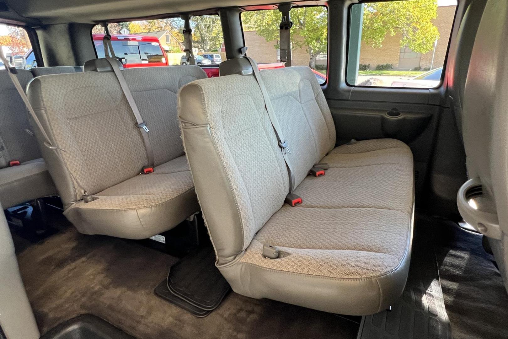 2019 Summit White /Gray CHEVROLET EXPRESS PASSENGER LT (1GAZGPFG3K1) with an VORTEC 6.0L V8 SFI FLEXFUEL engine, 8-speed automatic, electronically controlled with transmission, located at 2304 W. Main St., Boise, ID, 83702, (208) 342-7777, 43.622105, -116.218658 - 2019 CHEVROLET - Photo#6