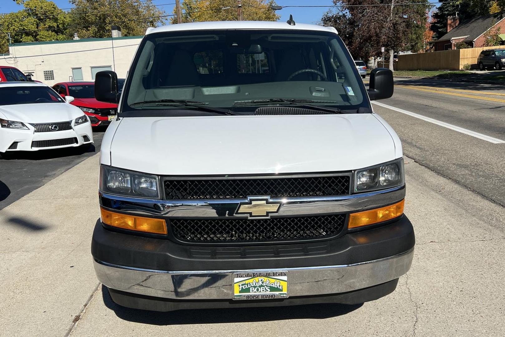 2019 Summit White /Gray CHEVROLET EXPRESS PASSENGER LT (1GAZGPFG3K1) with an VORTEC 6.0L V8 SFI FLEXFUEL engine, 8-speed automatic, electronically controlled with transmission, located at 2304 W. Main St., Boise, ID, 83702, (208) 342-7777, 43.622105, -116.218658 - 2019 CHEVROLET - Photo#1