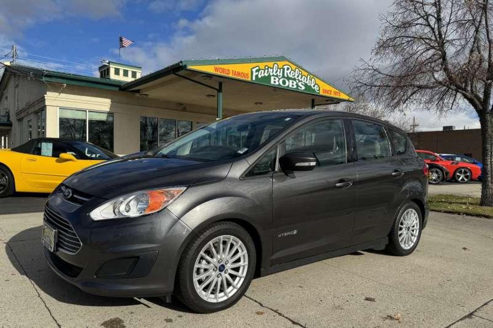 2015 Sterling Gray Metallic /Stone FORD C-MAX HYBRID SE (1FADP5AU3FL) with an 2.0L IVCT ATKINSON-CYCLE I-4 HYBRID engine, CONTINUOUSLY VARIABLE transmission, located at 2304 W. Main St., Boise, ID, 83702, (208) 342-7777, 43.622105, -116.218658 - 2015 FORD - Photo#0