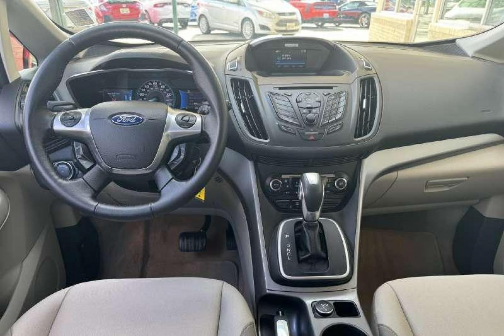 2015 Sterling Gray Metallic /Stone FORD C-MAX HYBRID SE (1FADP5AU3FL) with an 2.0L IVCT ATKINSON-CYCLE I-4 HYBRID engine, CONTINUOUSLY VARIABLE transmission, located at 2304 W. Main St., Boise, ID, 83702, (208) 342-7777, 43.622105, -116.218658 - 2015 FORD - Photo#9