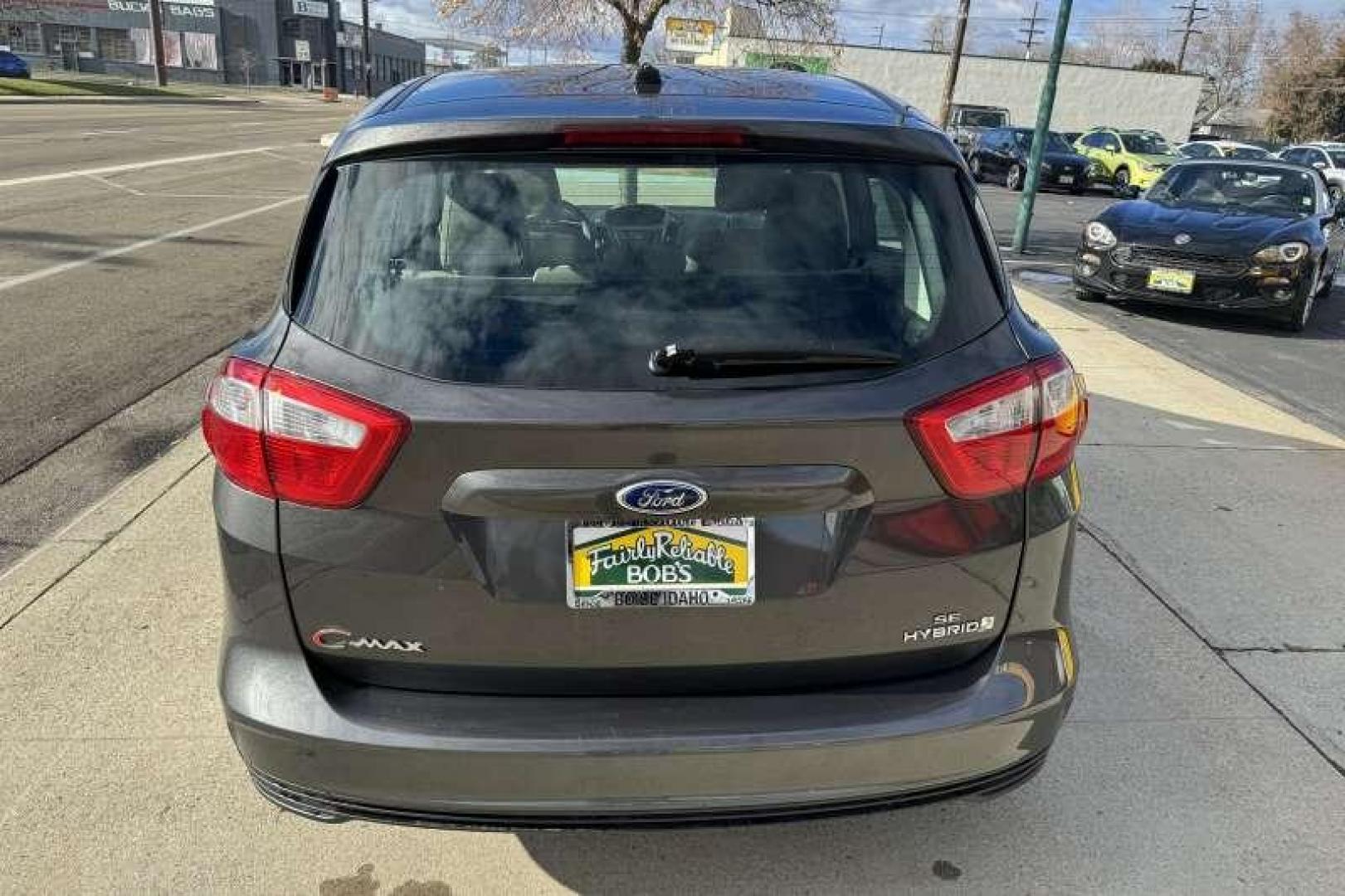 2015 Sterling Gray Metallic /Stone FORD C-MAX HYBRID SE (1FADP5AU3FL) with an 2.0L IVCT ATKINSON-CYCLE I-4 HYBRID engine, CONTINUOUSLY VARIABLE transmission, located at 2304 W. Main St., Boise, ID, 83702, (208) 342-7777, 43.622105, -116.218658 - 2015 FORD - Photo#1