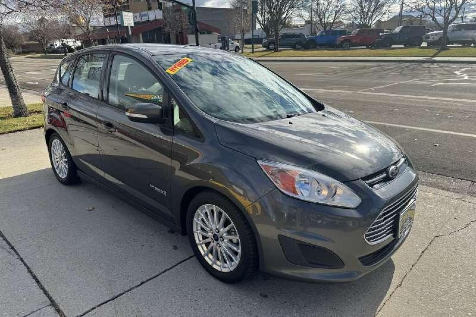 2015 Sterling Gray Metallic /Stone FORD C-MAX HYBRID SE (1FADP5AU3FL) with an 2.0L IVCT ATKINSON-CYCLE I-4 HYBRID engine, CONTINUOUSLY VARIABLE transmission, located at 2304 W. Main St., Boise, ID, 83702, (208) 342-7777, 43.622105, -116.218658 - 2015 FORD - Photo#2