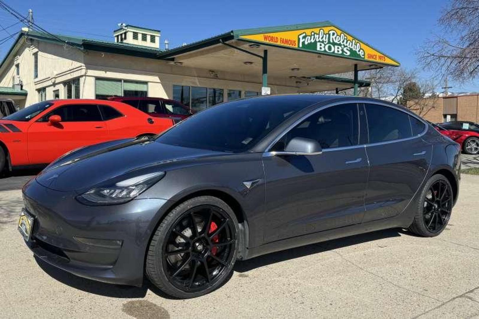 2018 Midnight Silver Metallic /Ultra White TESLA MODEL 3 PERFORMANCE (5YJ3E1EB1JF) with an Dual Motor: Fr AC Induction/ Rr AC Permanent Magnet engine, 1-Speed Automatic transmission, located at 2304 W. Main St., Boise, ID, 83702, (208) 342-7777, 43.622105, -116.218658 - 2018 TESLA - Photo#0