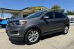 2022 Carbonized Gray Metallic /Black Ford Edge Titanium (2FMPK4K91NB) with an TWIN-SCROLL 2.0L ECOBOOST engine, Automatic 8 Speed transmission, located at 2304 W. Main St., Boise, ID, 83702, (208) 342-7777, 43.622105, -116.218658 - 2022 FORD - Photo#0