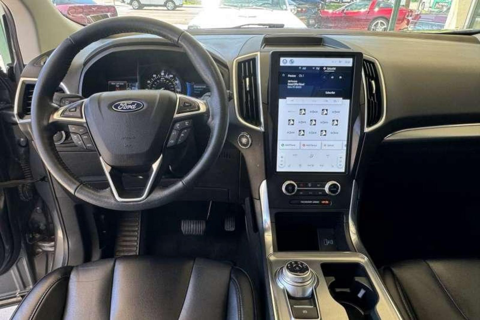 2022 Carbonized Gray Metallic /Black Ford Edge Titanium (2FMPK4K91NB) with an TWIN-SCROLL 2.0L ECOBOOST engine, Automatic 8 Speed transmission, located at 2304 W. Main St., Boise, ID, 83702, (208) 342-7777, 43.622105, -116.218658 - 2022 FORD - Photo#11