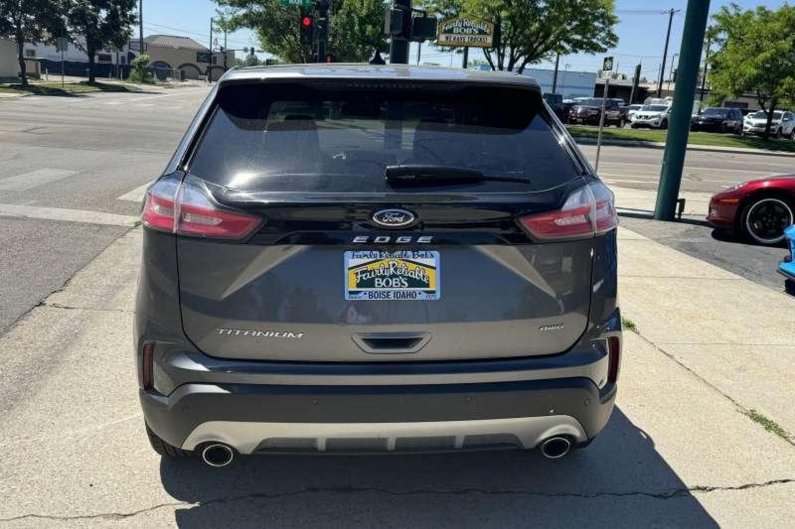 2022 Carbonized Gray Metallic /Black Ford Edge Titanium (2FMPK4K91NB) with an TWIN-SCROLL 2.0L ECOBOOST engine, Automatic 8 Speed transmission, located at 2304 W. Main St., Boise, ID, 83702, (208) 342-7777, 43.622105, -116.218658 - 2022 FORD - Photo#1