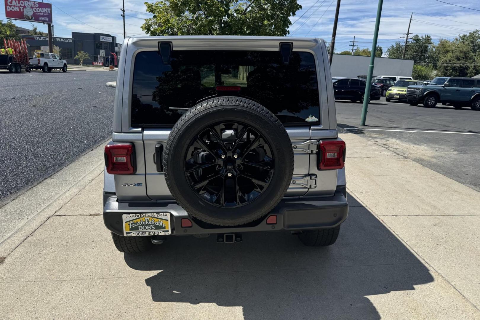 2021 Billet Silver /Black Jeep Wrangler Unlimited 4xe Sahara Unlimited Sahara (1C4JJXP6XMW) with an 2.0L I4 DOHC DI TURBO PHEV engine, Automatic 8 Speed transmission, located at 2304 W. Main St., Boise, ID, 83702, (208) 342-7777, 43.622105, -116.218658 - Photo#2