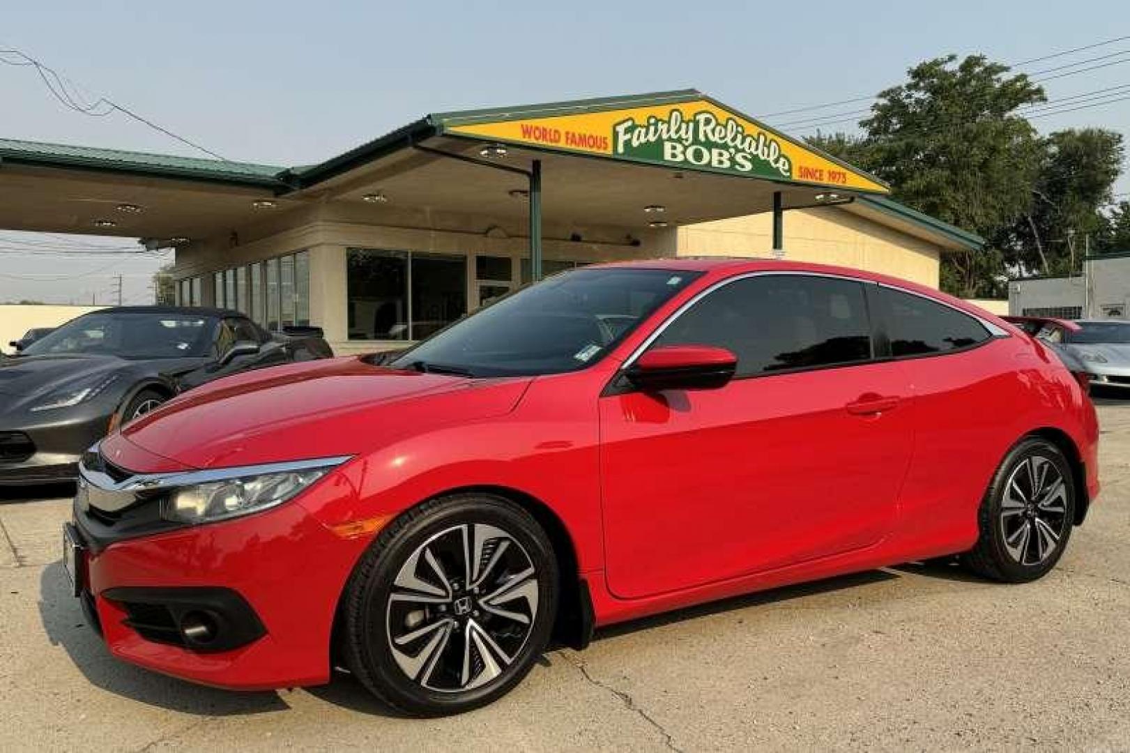 2016 Rallye Red /Black Honda Civic Coupe EX-T (2HGFC3B38GH) with an 4 Cyl 1.5 Liter Turbo engine, Automatic transmission, located at 2304 W. Main St., Boise, ID, 83702, (208) 342-7777, 43.622105, -116.218658 - Photo#0