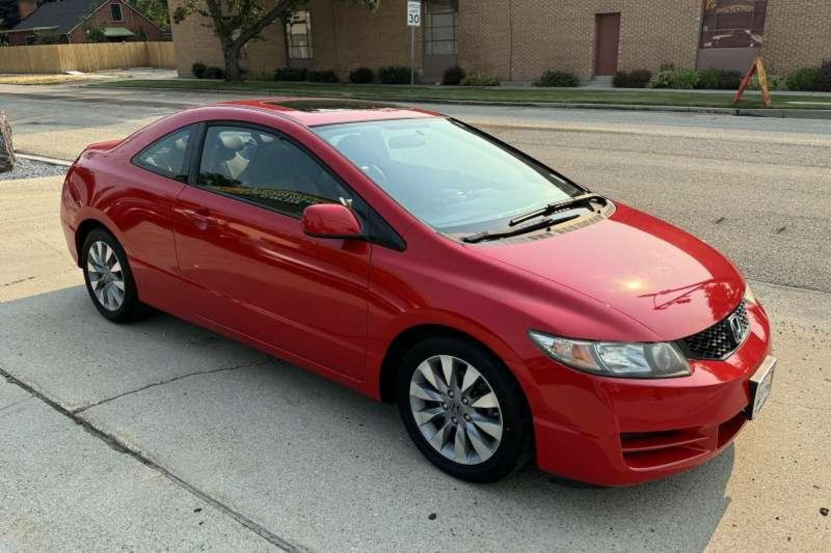 2010 Rallye Red /Black Honda Civic Coupe EX-L (2HGFG1B90AH) with an 4 Cyl 1.8 Liter engine, Automatic 5 Speed transmission, located at 2304 W. Main St., Boise, ID, 83702, (208) 342-7777, 43.622105, -116.218658 - 2010 HONDA - Photo#2