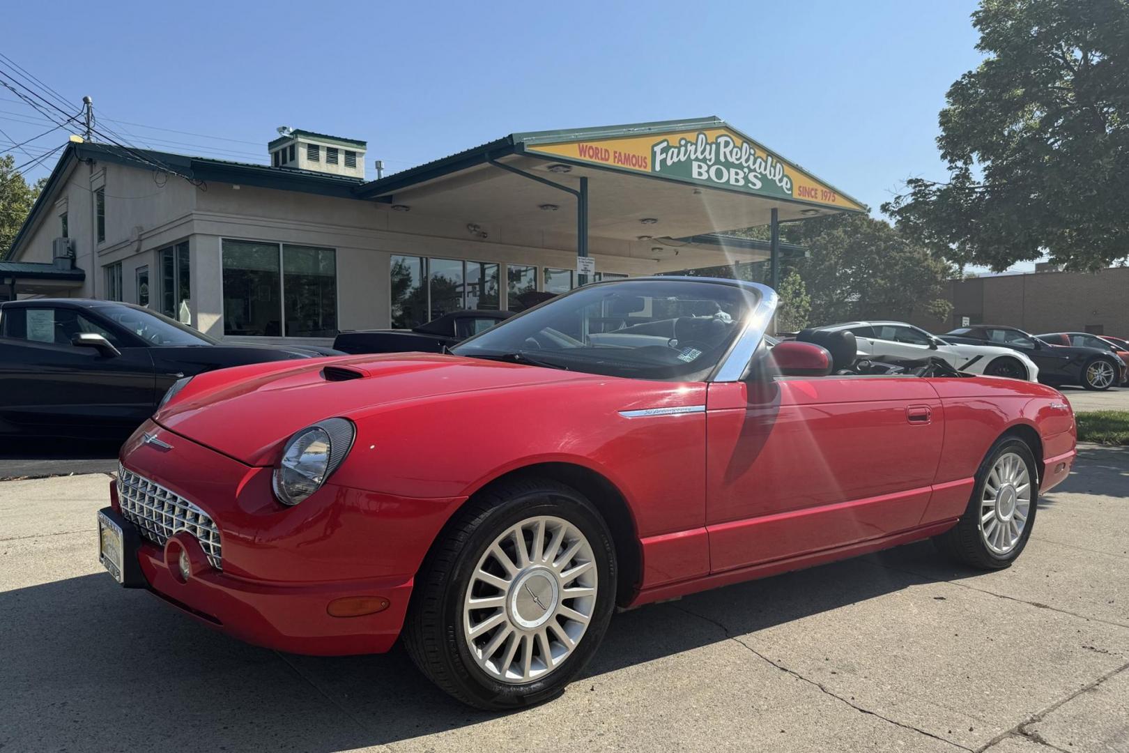 2005 Red /Black Ford Thunderbird Premium (1FAHP60A65Y) with an V8 3.9 Liter engine, Automatic 5 Speed transmission, located at 2304 W. Main St., Boise, ID, 83702, (208) 342-7777, 43.622105, -116.218658 - 2005 FORD - Photo#0