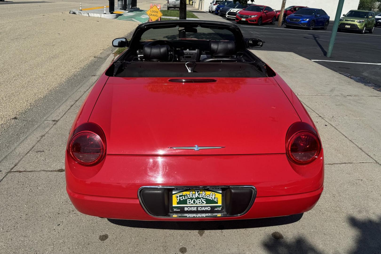 2005 Red /Black Ford Thunderbird Premium (1FAHP60A65Y) with an V8 3.9 Liter engine, Automatic 5 Speed transmission, located at 2304 W. Main St., Boise, ID, 83702, (208) 342-7777, 43.622105, -116.218658 - 2005 FORD - Photo#1