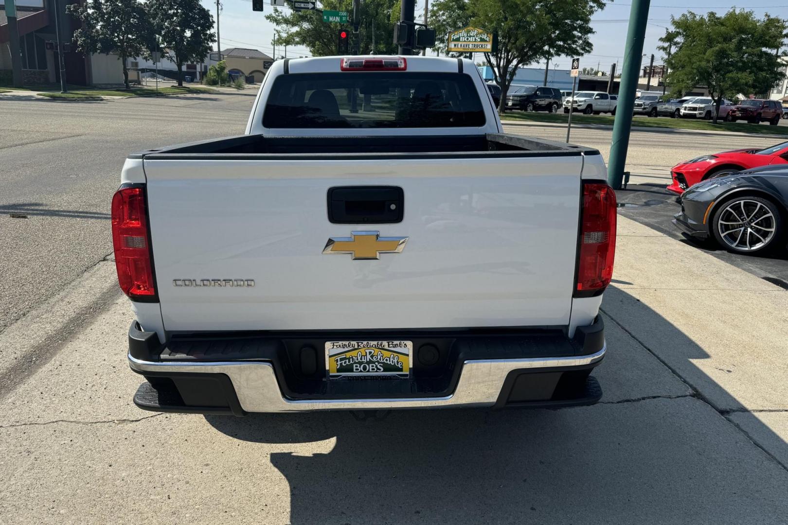 2015 Summit White /Black Chevrolet Colorado (1GCHSAEA4F1) with an 4 Cyl 2.5 Liter engine, Automatic transmission, located at 2304 W. Main St., Boise, ID, 83702, (208) 342-7777, 43.622105, -116.218658 - Photo#1