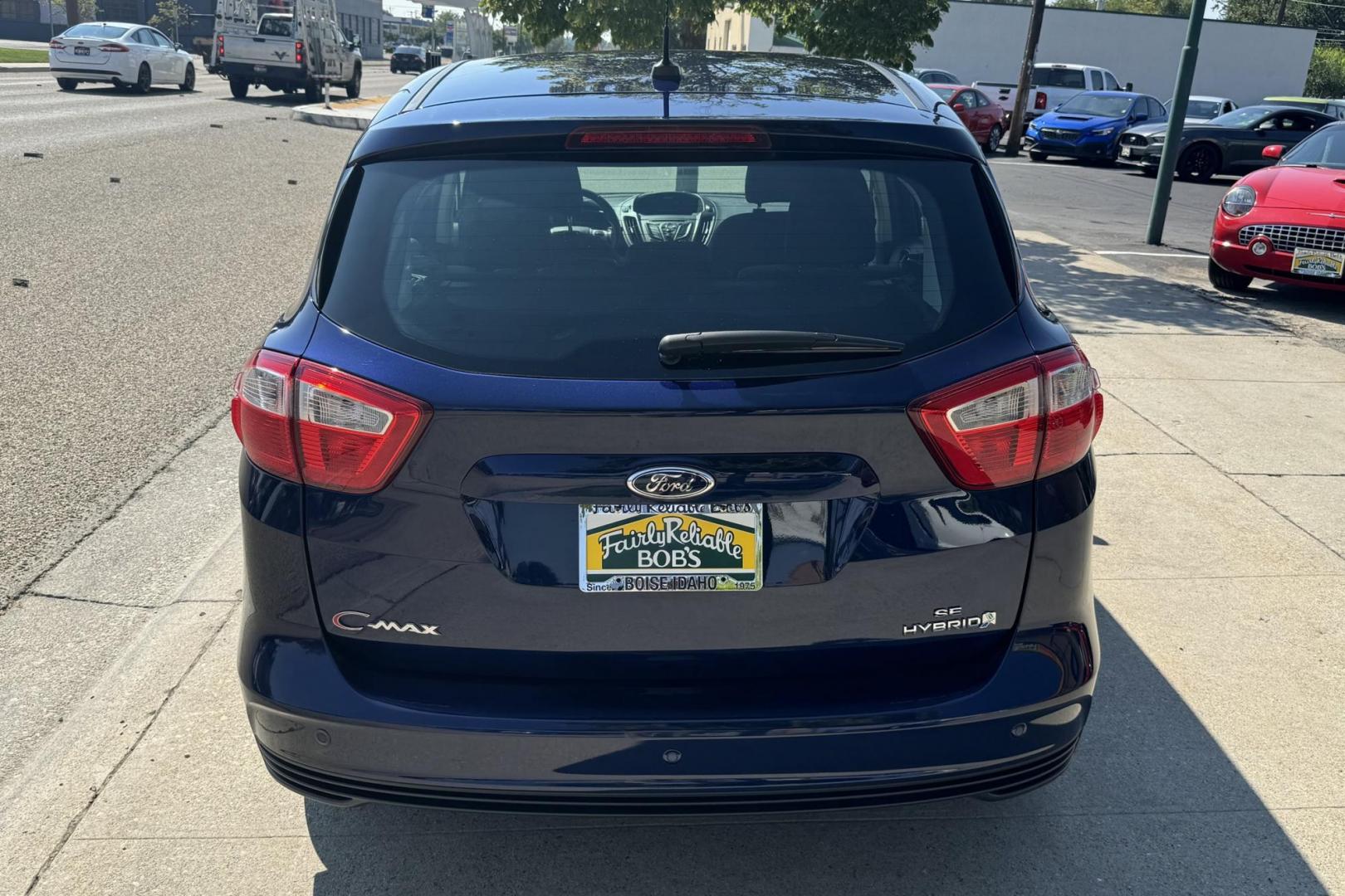 2016 Blue /Gray Ford C-Max Hybrid SE (1FADP5AU7GL) with an 4 Cyl 2.0 Liter Hybrid engine, Automatic transmission, located at 2304 W. Main St., Boise, ID, 83702, (208) 342-7777, 43.622105, -116.218658 - 2016 Ford C-Max Hybrid SE Hatchback - Photo#2