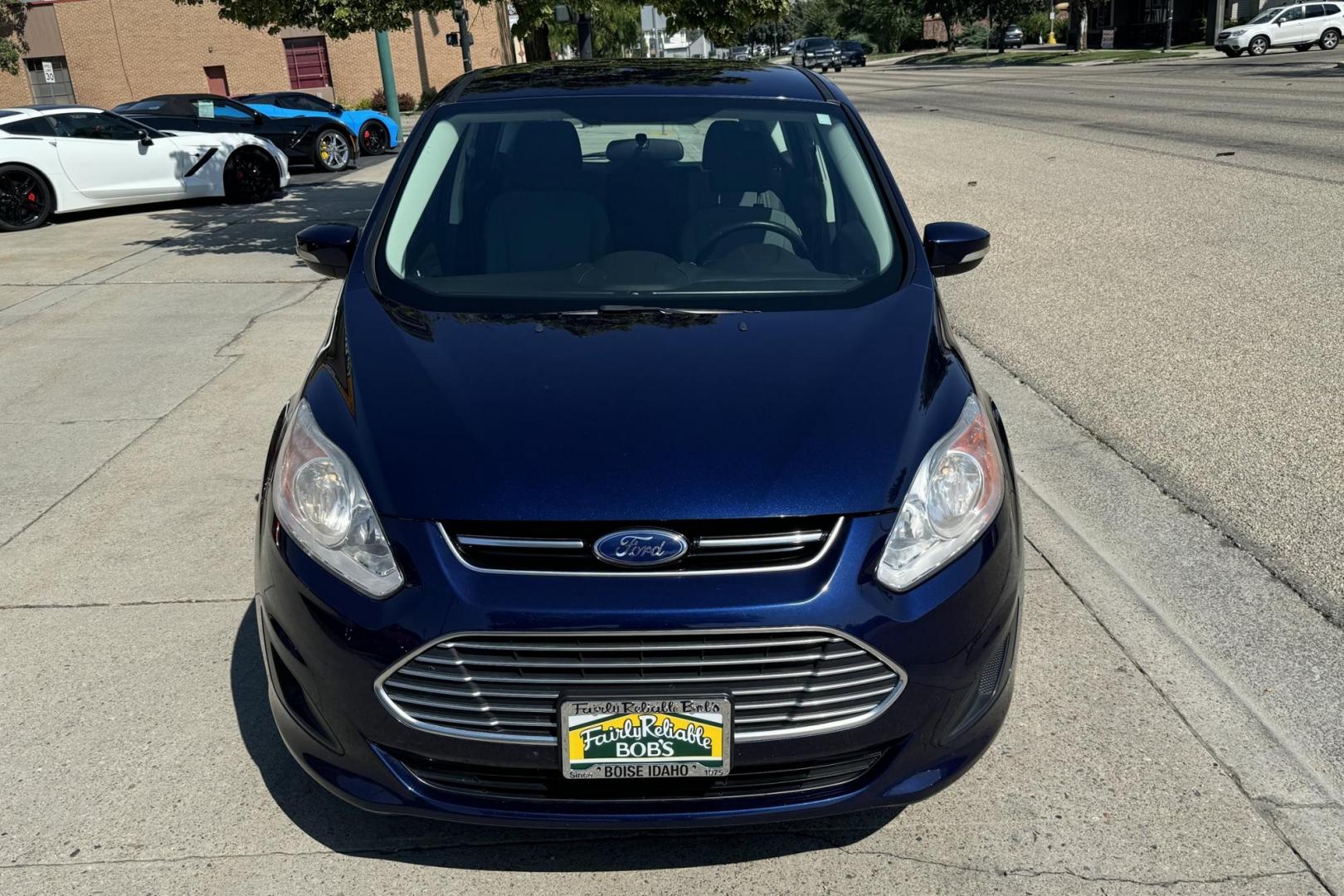 2016 Blue /Gray Ford C-Max Hybrid SE (1FADP5AU7GL) with an 4 Cyl 2.0 Liter Hybrid engine, Automatic transmission, located at 2304 W. Main St., Boise, ID, 83702, (208) 342-7777, 43.622105, -116.218658 - 2016 Ford C-Max Hybrid SE Hatchback - Photo#3