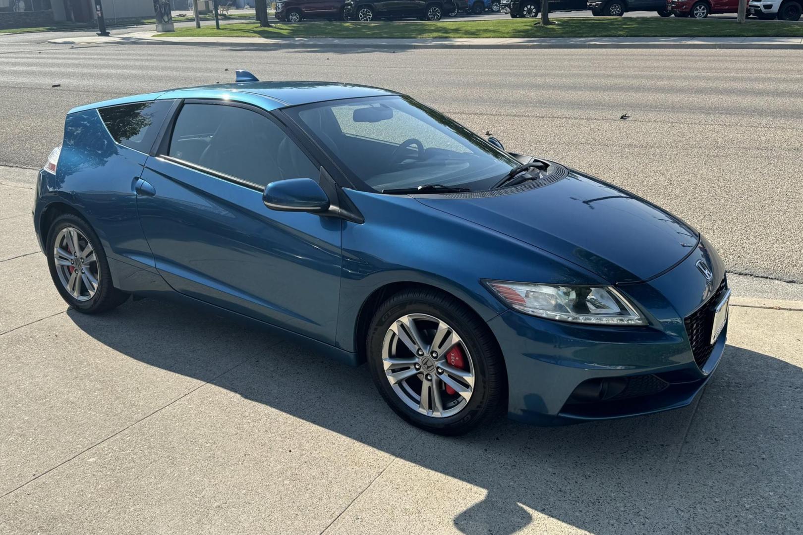 2013 North Shore Blue Pearl /Black Honda CR-Z EX EX (JHMZF1D66DS) with an 4 Cyl 1.5 Liter Hybrid engine, Automatic transmission, located at 2304 W. Main St., Boise, ID, 83702, (208) 342-7777, 43.622105, -116.218658 - Fuel Miser! Park Anywhere With Their Diminutive Size! - Photo#1