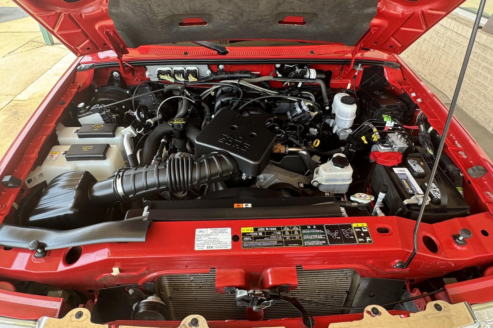 2011 Red /Black/Gray Ford Ranger XLT (1FTLR4FE2BP) with an V6 4.0 Liter engine, Automatic 5 Speed with Overdrive transmission, located at 2304 W. Main St., Boise, ID, 83702, (208) 342-7777, 43.622105, -116.218658 - Photo#9