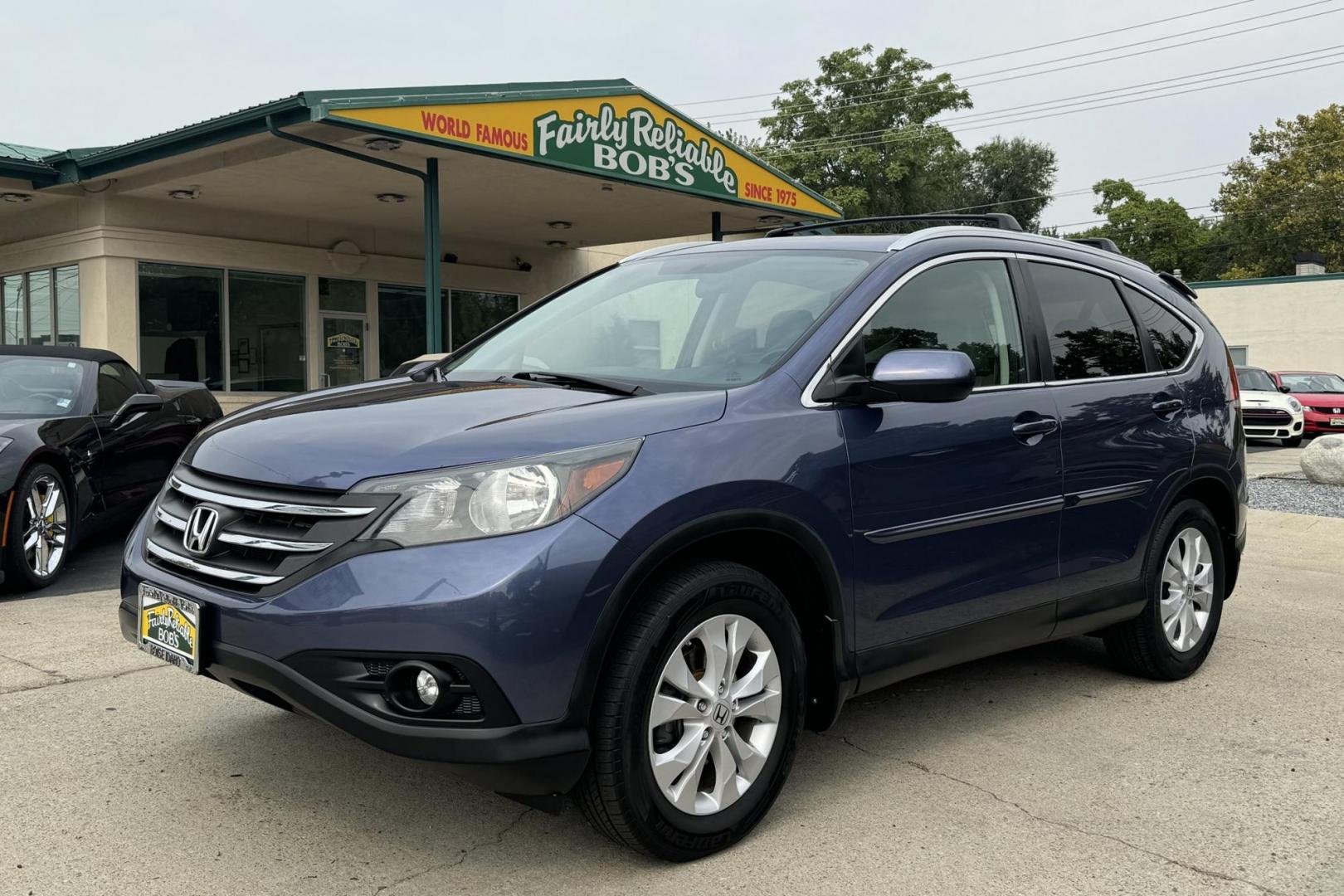 2013 Twilight Blue /Gray Honda CR-V EX-L (2HKRM4H73DH) with an 4 Cyl 2.4 Liter engine, Automatic 5 Speed transmission, located at 2304 W. Main St., Boise, ID, 83702, (208) 342-7777, 43.622105, -116.218658 - Photo#0