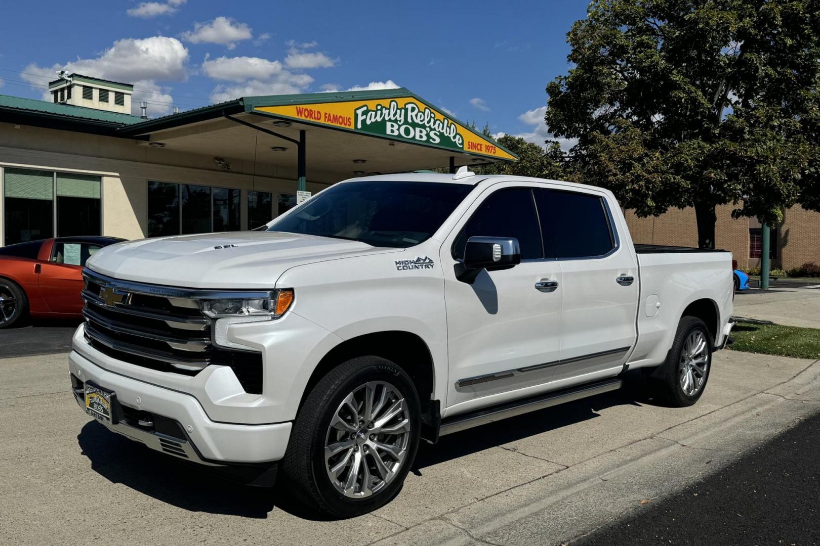 2022 Iridescent Pearl Tricoat /Jet Black/Nightshift Blue Chevrolet Silverado 1500 High Country High Country (3GCUDJEL6NG) with an V8 6.2 Liter engine, Automatic 10 Speed transmission, located at 2304 W. Main St., Boise, ID, 83702, (208) 342-7777, 43.622105, -116.218658 - Photo#0