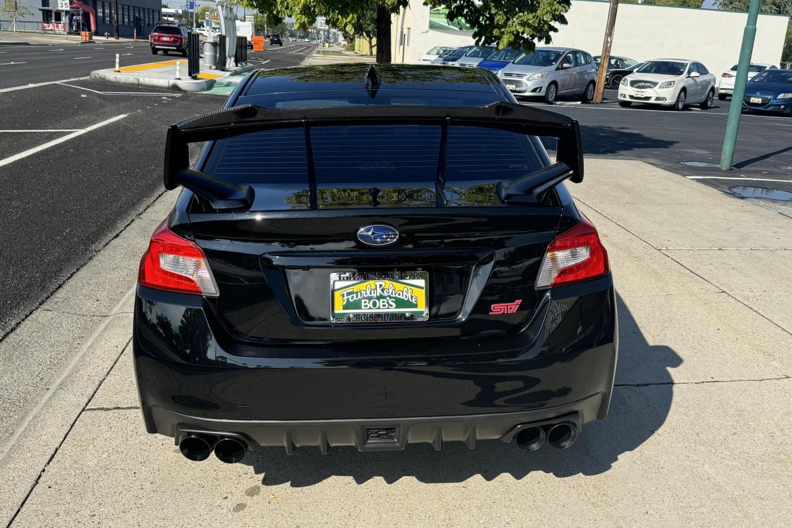 2020 Black /Black Subaru WRX STi (JF1VA2S60L9) with an H4 2.5 Liter Turbo engine, 6 Speed Manual transmission, located at 2304 W. Main St., Boise, ID, 83702, (208) 342-7777, 43.622105, -116.218658 - Clean STi! Ready To Go! - Photo#1