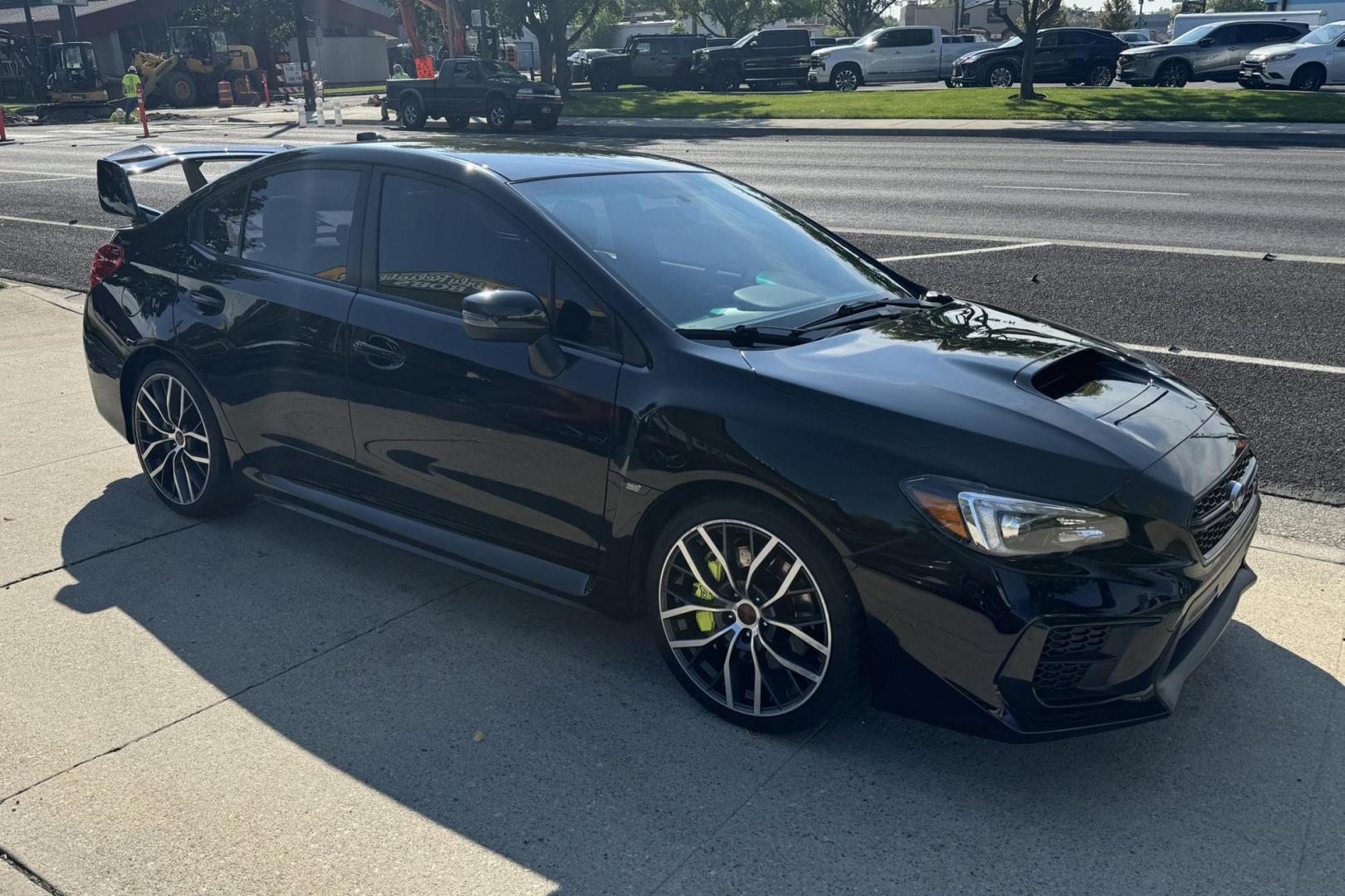 2020 Black /Black Subaru WRX STi (JF1VA2S60L9) with an H4 2.5 Liter Turbo engine, 6 Speed Manual transmission, located at 2304 W. Main St., Boise, ID, 83702, (208) 342-7777, 43.622105, -116.218658 - Clean STi! Ready To Go! - Photo#2