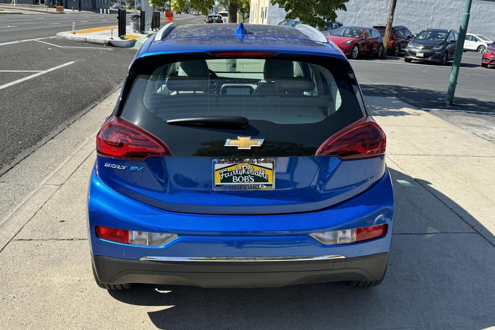 2018 Kinetic Blue Metallic /Light Ash Gray/Ceramic White Chevrolet Bolt Premier Premier (1G1FX6S07J4) with an 60 kWh engine, Automatic transmission, located at 2304 W. Main St., Boise, ID, 83702, (208) 342-7777, 43.622105, -116.218658 - Photo#1