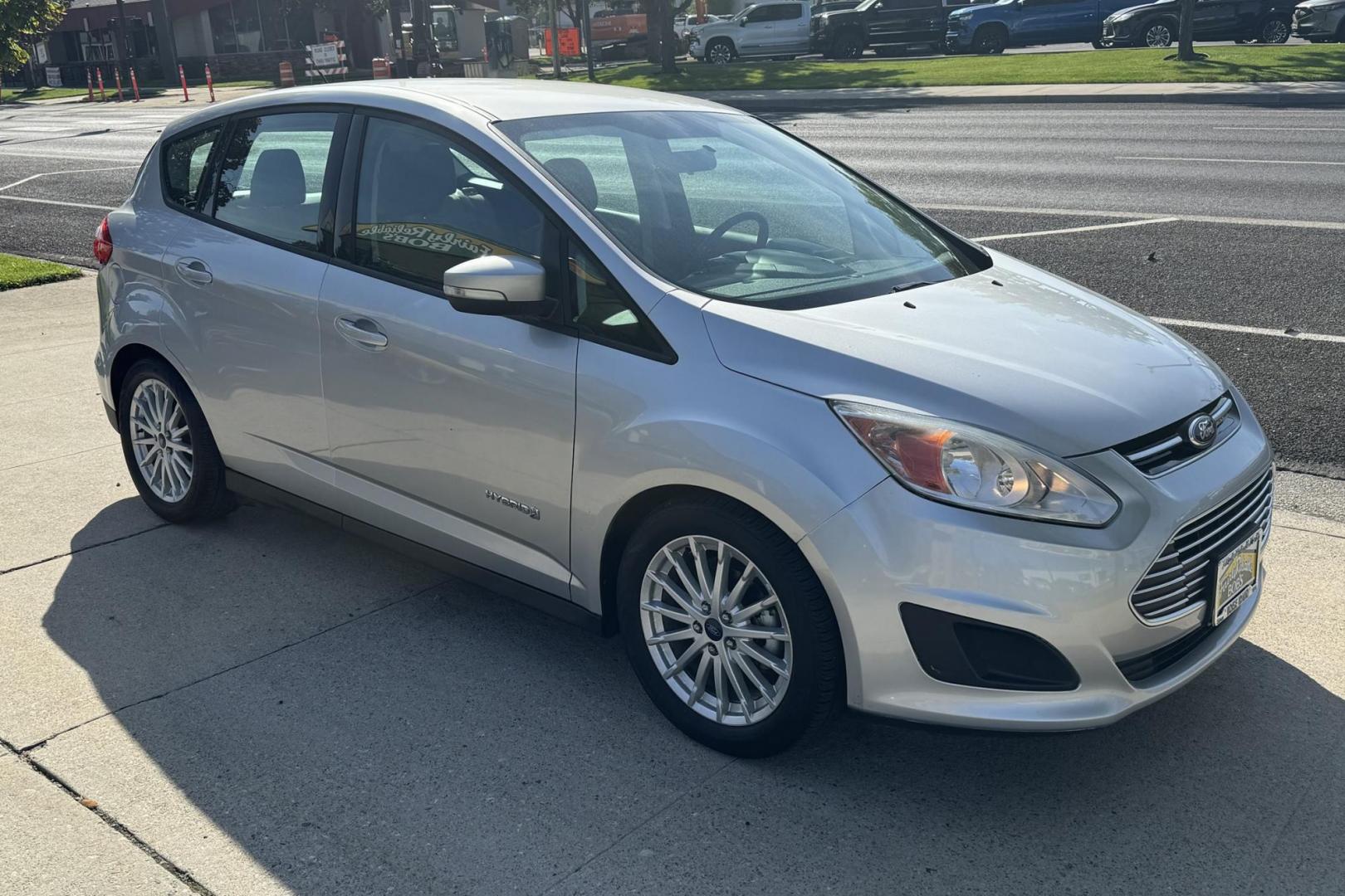 2015 Silver /Tan Ford C-Max Hybrid SE (1FADP5AU9FL) with an 4 Cyl 2.0 Liter Hybrid engine, Automatic transmission, located at 2304 W. Main St., Boise, ID, 83702, (208) 342-7777, 43.622105, -116.218658 - Great Fuel Economy! High Reliability, New Tires Too! - Photo#1