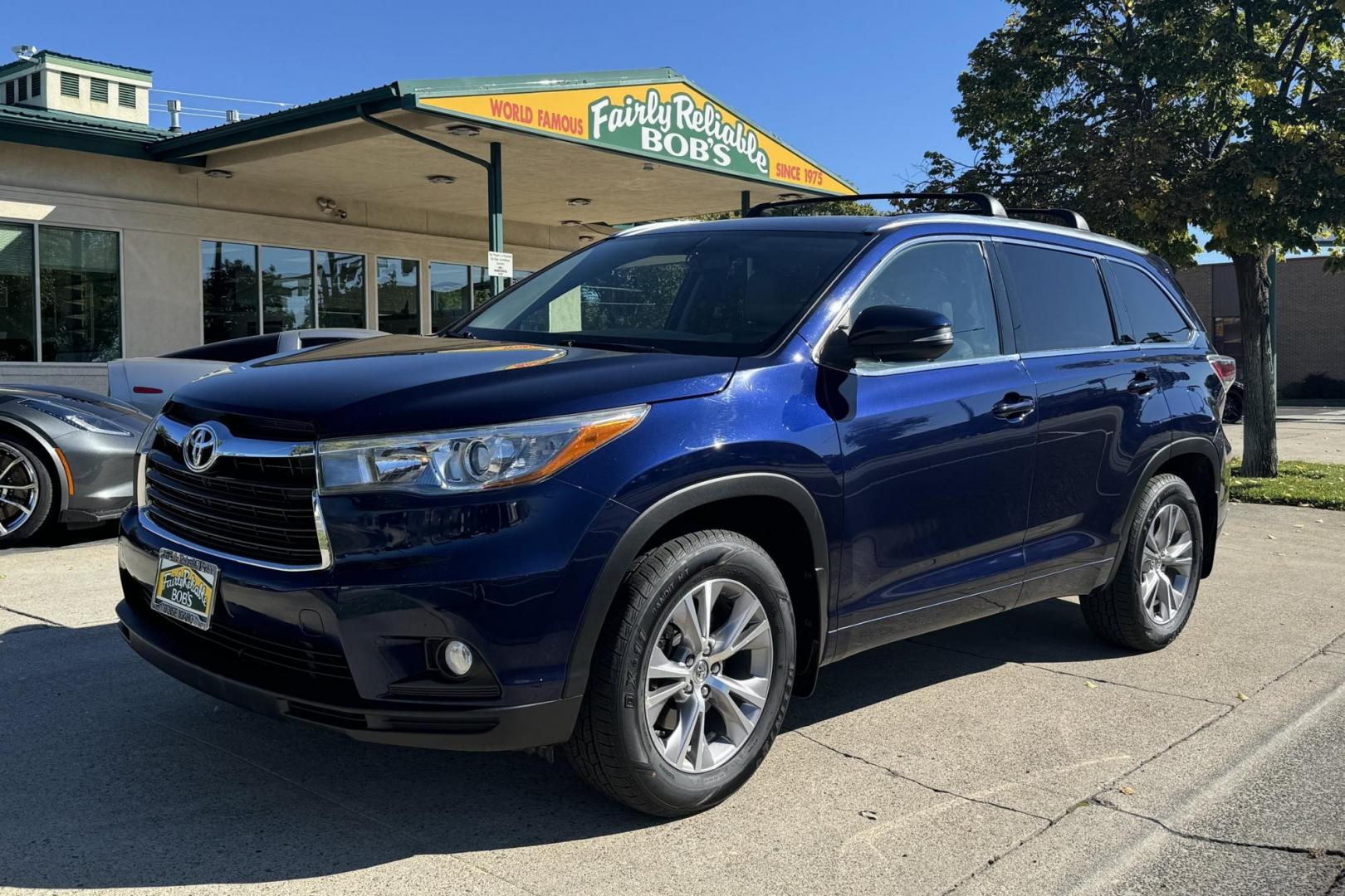 2015 Nautical Blue Metallic /Gray Toyota Highlander XLE (5TDJKRFH1FS) with an V6 3.5 Liter engine, Automatic 6 Speed transmission, located at 2304 W. Main St., Boise, ID, 83702, (208) 342-7777, 43.622105, -116.218658 - Hard To Find! Great To Own! New Tires Too! - Photo#0