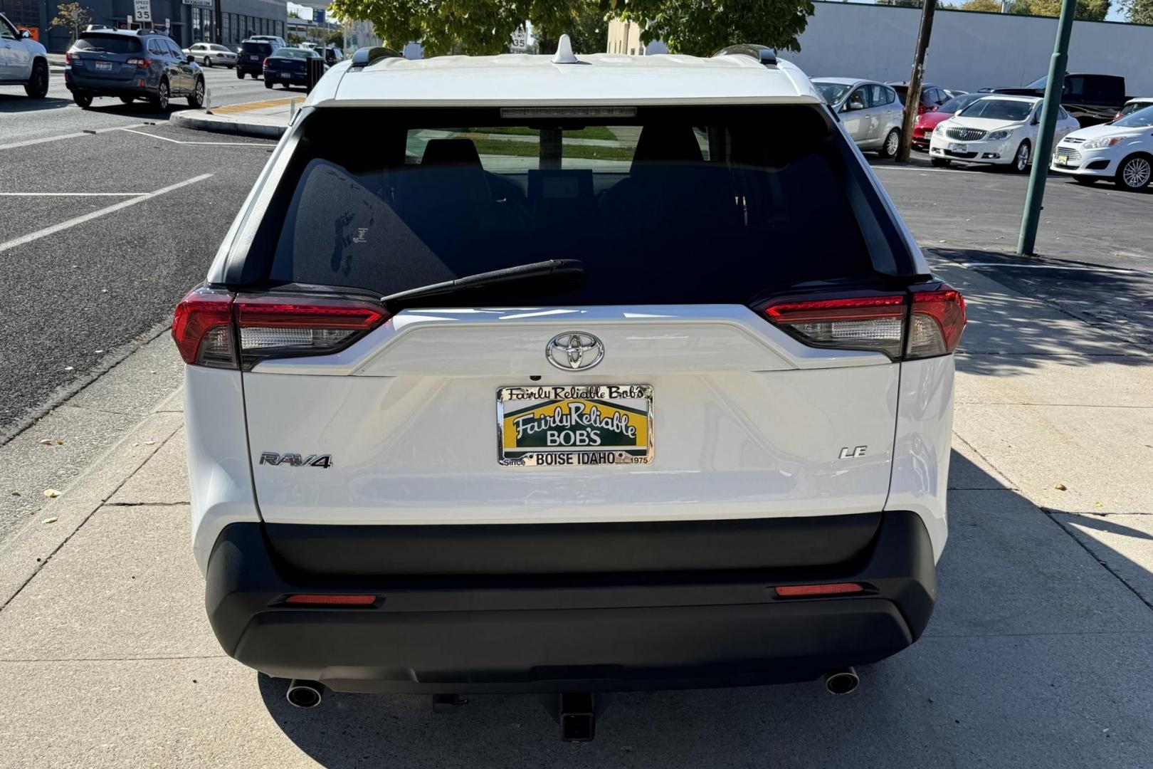 2019 Super White /Light Oak Toyota RAV4 LE (JTMH1RFV1KJ) with an 4 Cyl 2.5 Liter engine, Automatic 8 Speed transmission, located at 2304 W. Main St., Boise, ID, 83702, (208) 342-7777, 43.622105, -116.218658 - New Tires! Great Fuel Economy! - Photo#1