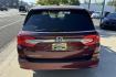 2019 Radiant Red Metallic /Light Oak Honda Odyssey Elite (5FNRL6H94KB) with an V6 3.5 Liter engine, Automatic 10 Speed transmission, located at 2304 W. Main St., Boise, ID, 83702, (208) 342-7777, 43.622105, -116.218658 - Hauls 8 People And Will Entertain The Passengers With A Factory Blu Ray DVD System. - Photo#1