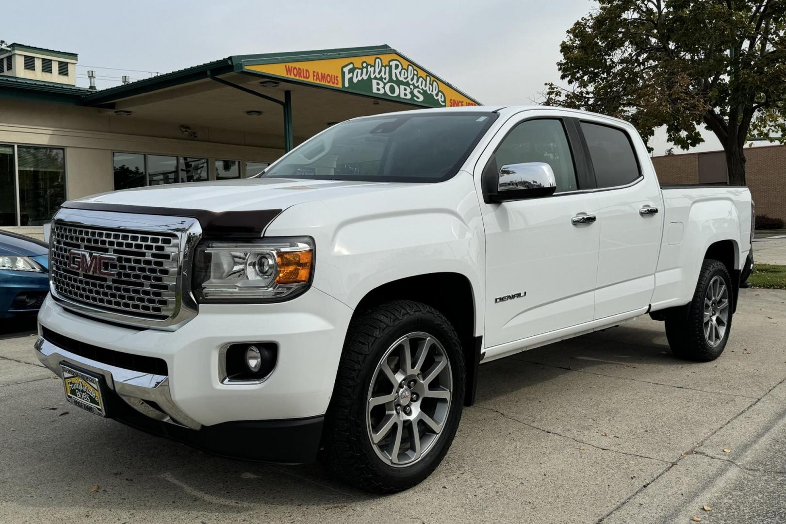 2018 Summit White /Jet Black GMC Canyon Crew Cab Denali (1GTG6EEN5J1) with an V6 3.6 Liter engine, Automatic 8 Speed transmission, located at 2304 W. Main St., Boise, ID, 83702, (208) 342-7777, 43.622105, -116.218658 - Very Clean Canyon! Well Optioned Too! - Photo#0