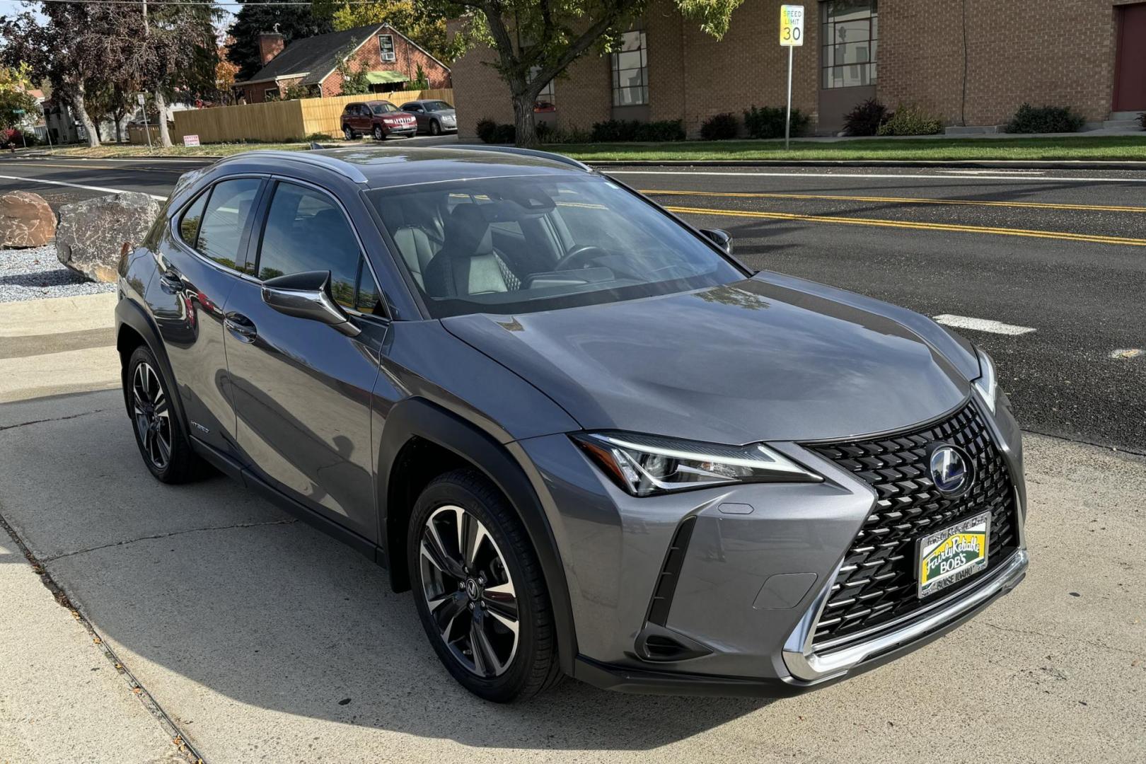 2021 Dark Gray Metallic /Black Lexus UX 250H Premium (JTHP9JBH6M2) with an 4 Cyl 2.0 Liter Hybrid engine, Automatic transmission, located at 2304 W. Main St., Boise, ID, 83702, (208) 342-7777, 43.622105, -116.218658 - Photo#1