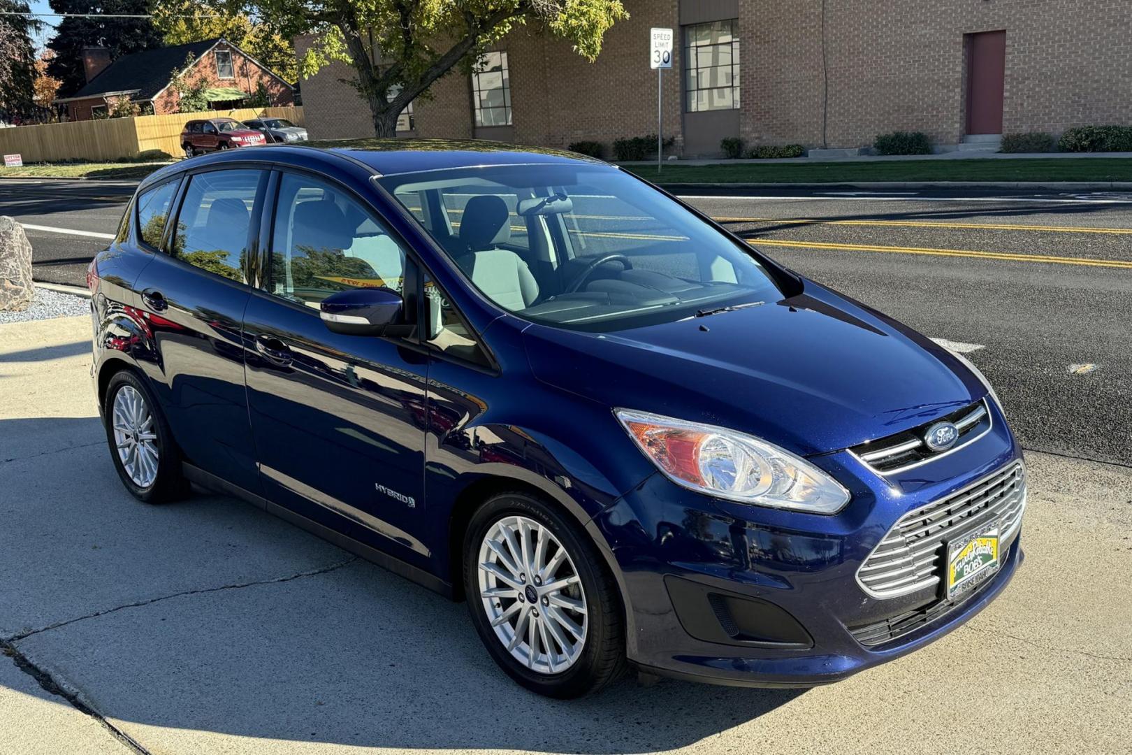 2016 Kona Blue /Gray Ford C-Max Hybrid SE (1FADP5AU4GL) with an 4 Cyl 2.0 Liter Hybrid engine, Automatic transmission, located at 2304 W. Main St., Boise, ID, 83702, (208) 342-7777, 43.622105, -116.218658 - Great Fuel Economy! New Tires Too! - Photo#2