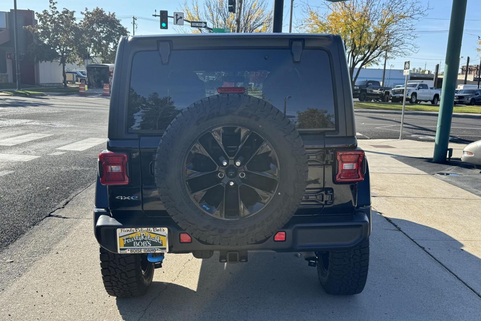 2022 Black /Black Jeep Wrangler 4XE Unlimited Sahara (1C4JJXP68NW) , Automatic 8 Speed transmission, located at 2304 W. Main St., Boise, ID, 83702, (208) 342-7777, 43.622105, -116.218658 - Photo#1