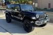 2022 Black /Black Jeep Wrangler 4XE Unlimited Sahara (1C4JJXP68NW) , Automatic 8 Speed transmission, located at 2304 W. Main St., Boise, ID, 83702, (208) 342-7777, 43.622105, -116.218658 - Photo#2