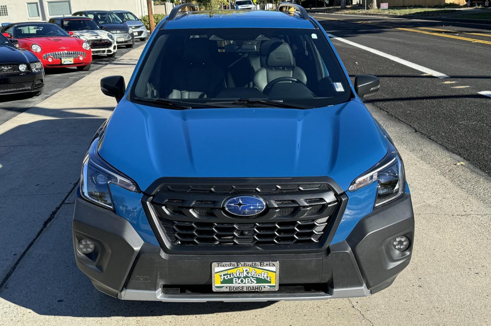 2022 Geyser Blue /Black Subaru Forester Wilderness (JF2SKAMC5NH) with an H4 2.5 Liter engine, Automatic transmission, located at 2304 W. Main St., Boise, ID, 83702, (208) 342-7777, 43.622105, -116.218658 - Financing Available O.A.C. - Photo#2