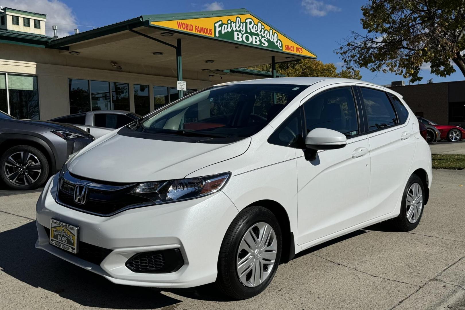 2019 White /Black Honda Fit LX (3HGGK5H4XKM) with an 4 Cyl 1.5 Liter engine, Automatic transmission, located at 2304 W. Main St., Boise, ID, 83702, (208) 342-7777, 43.622105, -116.218658 - Only 18k Miles! - Photo#0