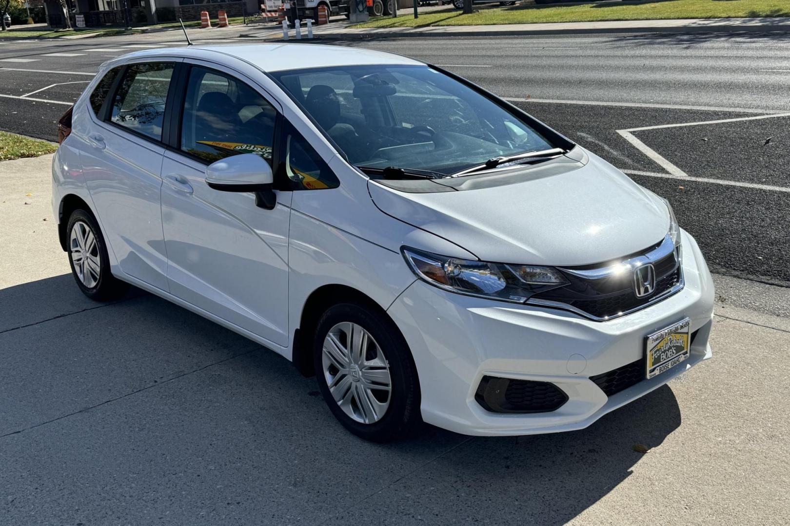 2019 White /Black Honda Fit LX (3HGGK5H4XKM) with an 4 Cyl 1.5 Liter engine, Automatic transmission, located at 2304 W. Main St., Boise, ID, 83702, (208) 342-7777, 43.622105, -116.218658 - Only 18k Miles! - Photo#2